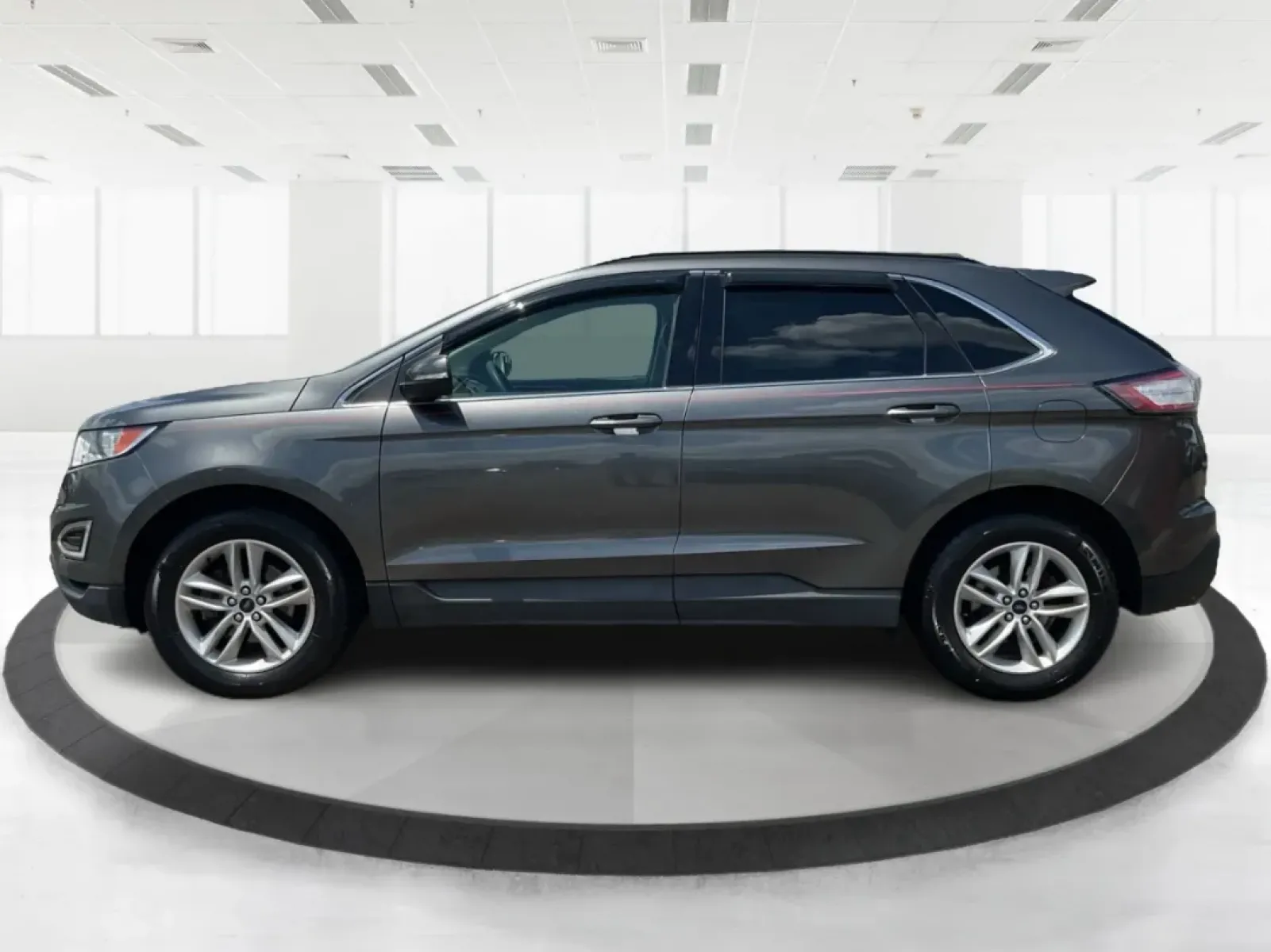 2016 Ford Edge SEL (2FMPK3J91GB) with an 3.5L V-6 DOHC engine, located at 1099 N County Rd 25A , Troy, OH, 45373, (937) 908-9800, 40.057079, -84.212883 - **Experience the Road Ahead with the 2016 Ford Edge SEL - Your Adventure Awaits!**<br /> <br /> Are you ready for your next road trip or family outing? The 2016 Ford Edge SEL is not just a car; it's a versatile SUV that caters to your lifestyle needs, making it the perfect companion for growing fami - Photo#5