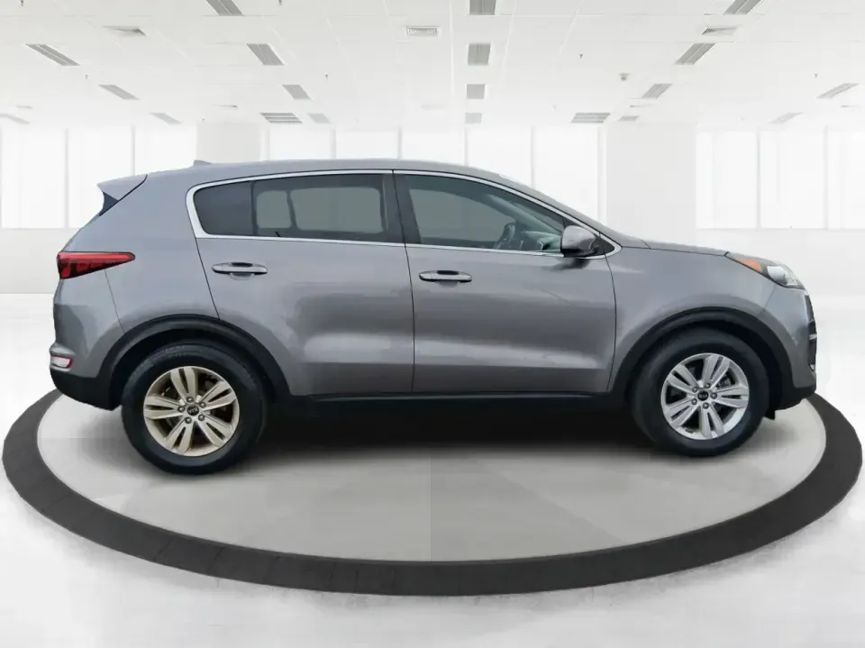 2018 Kia Sportage LX (KNDPM3AC0J7) with an Theta II 2.4L I-4 gasoline direct injection engine, 6A transmission, located at 1099 N County Rd 25A , Troy, OH, 45373, (937) 908-9800, 40.057079, -84.212883 - Weekend road trips to the Miami County Fair, daily commutes down I75, or quick errands between Downtown Troy and the shops near West Main Street-this 2018 Kia Sportage LX is the kind of compact SUV that fits real life. With its versatile crossover layout, confident road manners, and smart cargo spac - Photo#1