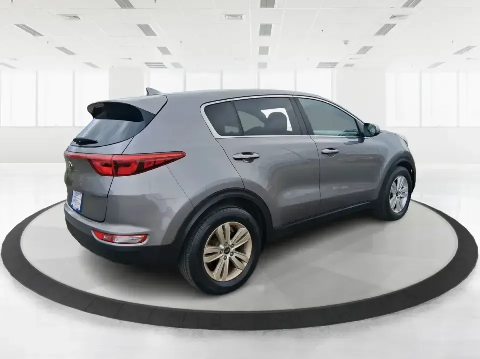 2018 Kia Sportage LX (KNDPM3AC0J7) with an Theta II 2.4L I-4 gasoline direct injection engine, 6A transmission, located at 1099 N County Rd 25A , Troy, OH, 45373, (937) 908-9800, 40.057079, -84.212883 - Weekend road trips to the Miami County Fair, daily commutes down I75, or quick errands between Downtown Troy and the shops near West Main Street-this 2018 Kia Sportage LX is the kind of compact SUV that fits real life. With its versatile crossover layout, confident road manners, and smart cargo spac - Photo#2