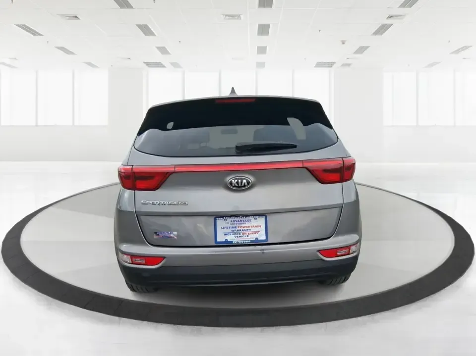 2018 Kia Sportage LX (KNDPM3AC0J7) with an Theta II 2.4L I-4 gasoline direct injection engine, 6A transmission, located at 1099 N County Rd 25A , Troy, OH, 45373, (937) 908-9800, 40.057079, -84.212883 - Weekend road trips to the Miami County Fair, daily commutes down I75, or quick errands between Downtown Troy and the shops near West Main Street-this 2018 Kia Sportage LX is the kind of compact SUV that fits real life. With its versatile crossover layout, confident road manners, and smart cargo spac - Photo#3