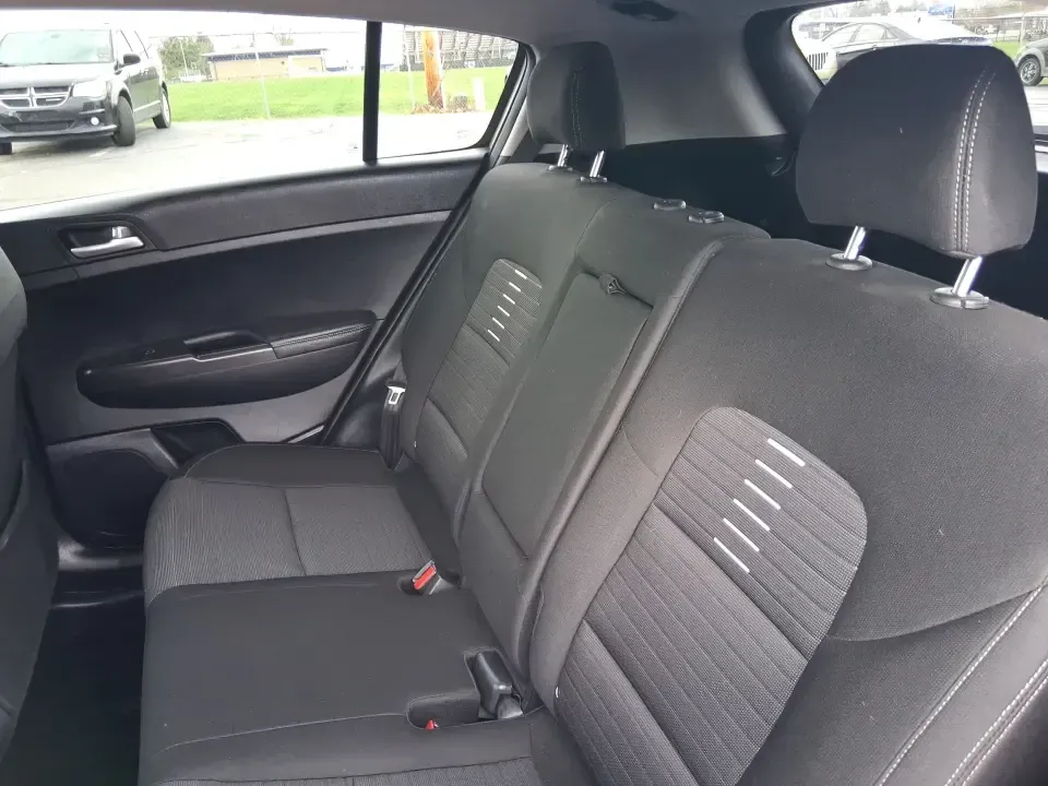 2018 Kia Sportage LX (KNDPM3AC0J7) with an Theta II 2.4L I-4 gasoline direct injection engine, 6A transmission, located at 1099 N County Rd 25A , Troy, OH, 45373, (937) 908-9800, 40.057079, -84.212883 - Weekend road trips to the Miami County Fair, daily commutes down I75, or quick errands between Downtown Troy and the shops near West Main Street-this 2018 Kia Sportage LX is the kind of compact SUV that fits real life. With its versatile crossover layout, confident road manners, and smart cargo spac - Photo#10