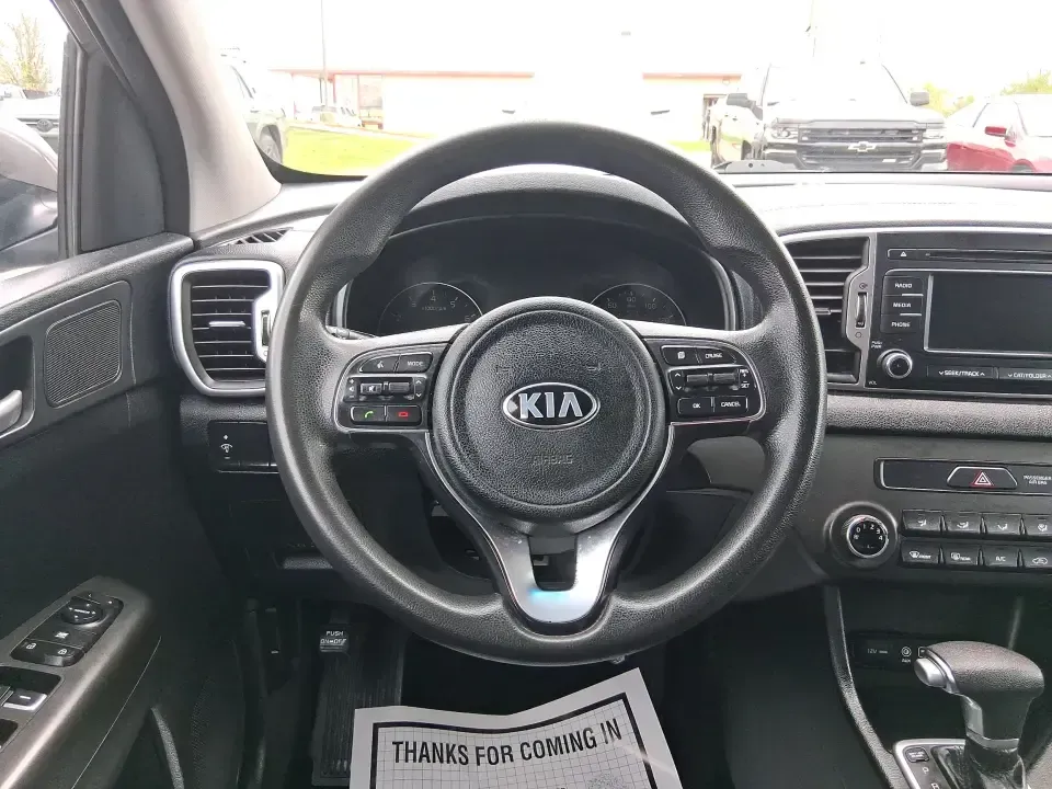 2018 Kia Sportage LX (KNDPM3AC0J7) with an Theta II 2.4L I-4 gasoline direct injection engine, 6A transmission, located at 1099 N County Rd 25A , Troy, OH, 45373, (937) 908-9800, 40.057079, -84.212883 - Weekend road trips to the Miami County Fair, daily commutes down I75, or quick errands between Downtown Troy and the shops near West Main Street-this 2018 Kia Sportage LX is the kind of compact SUV that fits real life. With its versatile crossover layout, confident road manners, and smart cargo spac - Photo#16