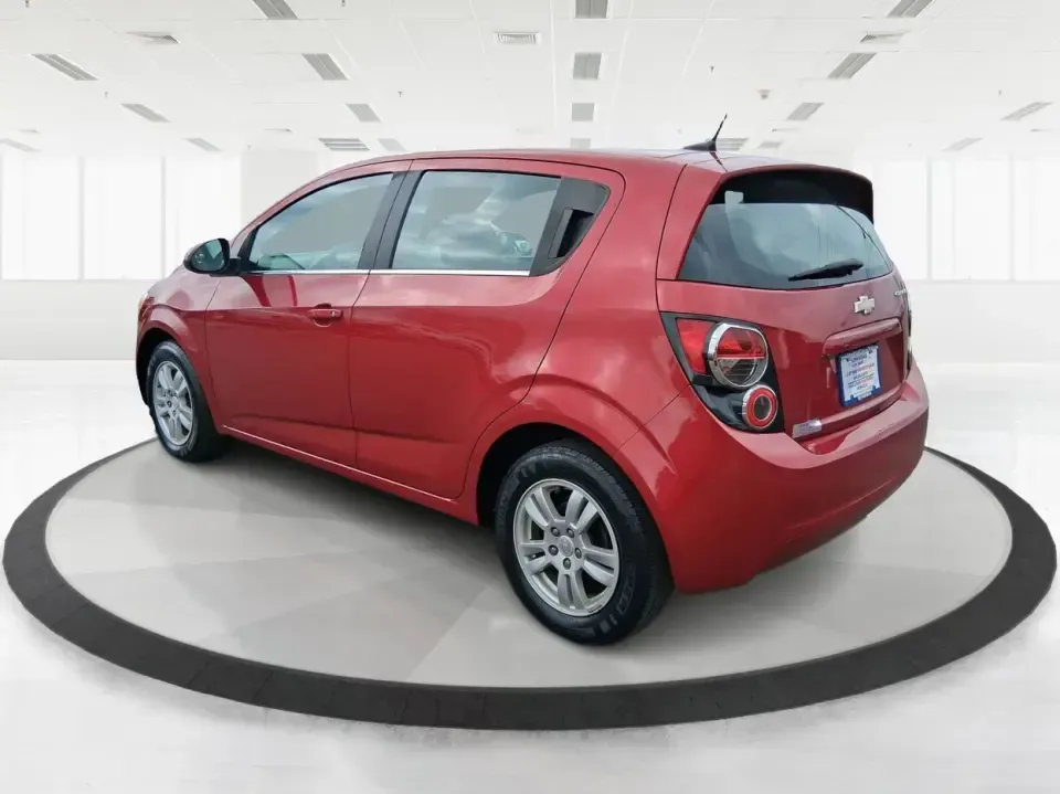 2014 Chevrolet Sonic LT Auto (1G1JC6SH7E4) with an 1.8L L4 DOHC 24V engine, 6-Speed Automatic transmission, located at 1099 N County Rd 25A , Troy, OH, 45373, (937) 908-9800, 40.057079, -84.212883 - Need a smart, easy-to-park commuter that still has room for grocery runs, school backpacks, and weekend getaways to Dayton or the Miami Valley? This 2014 Chevrolet Sonic LT Auto Hatchback delivers the kind of real-world versatility that fits everyday life in Troy-zippy around town, efficient for lon - Photo#4