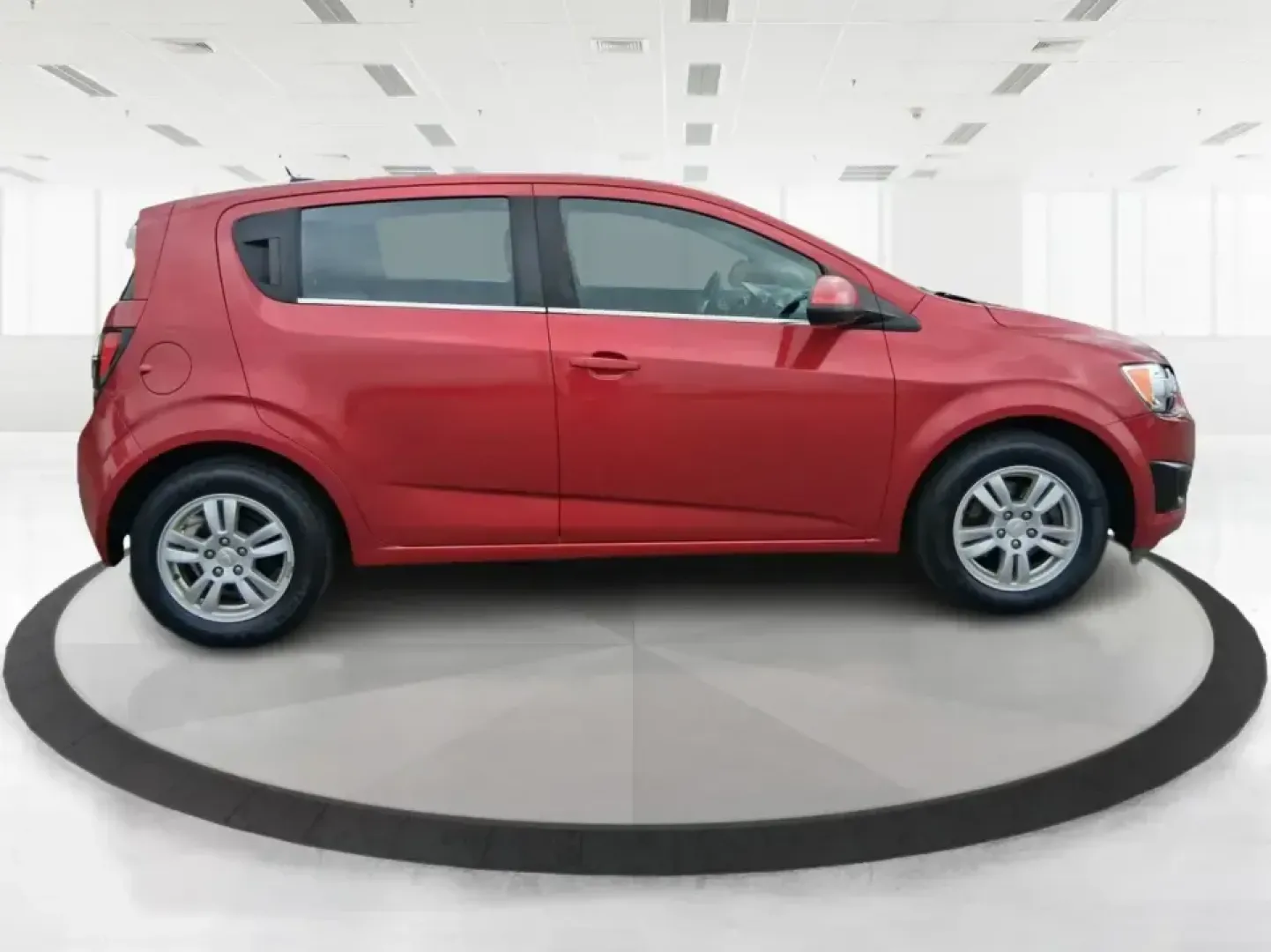 2014 Chevrolet Sonic LT Auto (1G1JC6SH7E4) with an 1.8L L4 DOHC 24V engine, 6-Speed Automatic transmission, located at 1230 East Main St, Xenia, OH, 45385, (937) 908-9800, 39.688026, -83.910172 - Need a smart, easy-to-park commuter that still has room for grocery runs, school backpacks, and weekend getaways to Dayton or the Miami Valley? This 2014 Chevrolet Sonic LT Auto Hatchback delivers the kind of real-world versatility that fits everyday life in Troy-zippy around town, efficient for lon - Photo#1