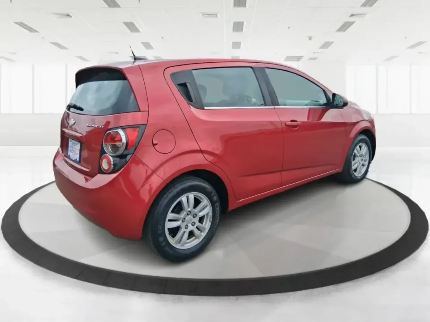 2014 Chevrolet Sonic LT Auto (1G1JC6SH7E4) with an 1.8L L4 DOHC 24V engine, 6-Speed Automatic transmission, located at 1230 East Main St, Xenia, OH, 45385, (937) 908-9800, 39.688026, -83.910172 - Need a smart, easy-to-park commuter that still has room for grocery runs, school backpacks, and weekend getaways to Dayton or the Miami Valley? This 2014 Chevrolet Sonic LT Auto Hatchback delivers the kind of real-world versatility that fits everyday life in Troy-zippy around town, efficient for lon - Photo#2