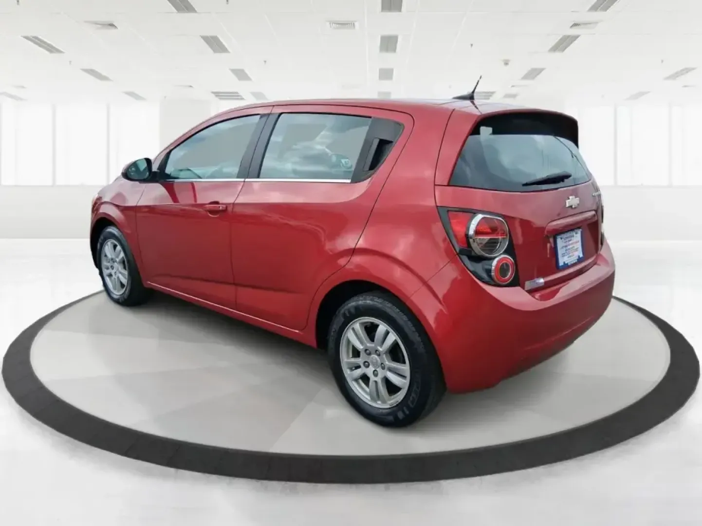 2014 Chevrolet Sonic LT Auto (1G1JC6SH7E4) with an 1.8L L4 DOHC 24V engine, 6-Speed Automatic transmission, located at 1230 East Main St, Xenia, OH, 45385, (937) 908-9800, 39.688026, -83.910172 - Need a smart, easy-to-park commuter that still has room for grocery runs, school backpacks, and weekend getaways to Dayton or the Miami Valley? This 2014 Chevrolet Sonic LT Auto Hatchback delivers the kind of real-world versatility that fits everyday life in Troy-zippy around town, efficient for lon - Photo#4