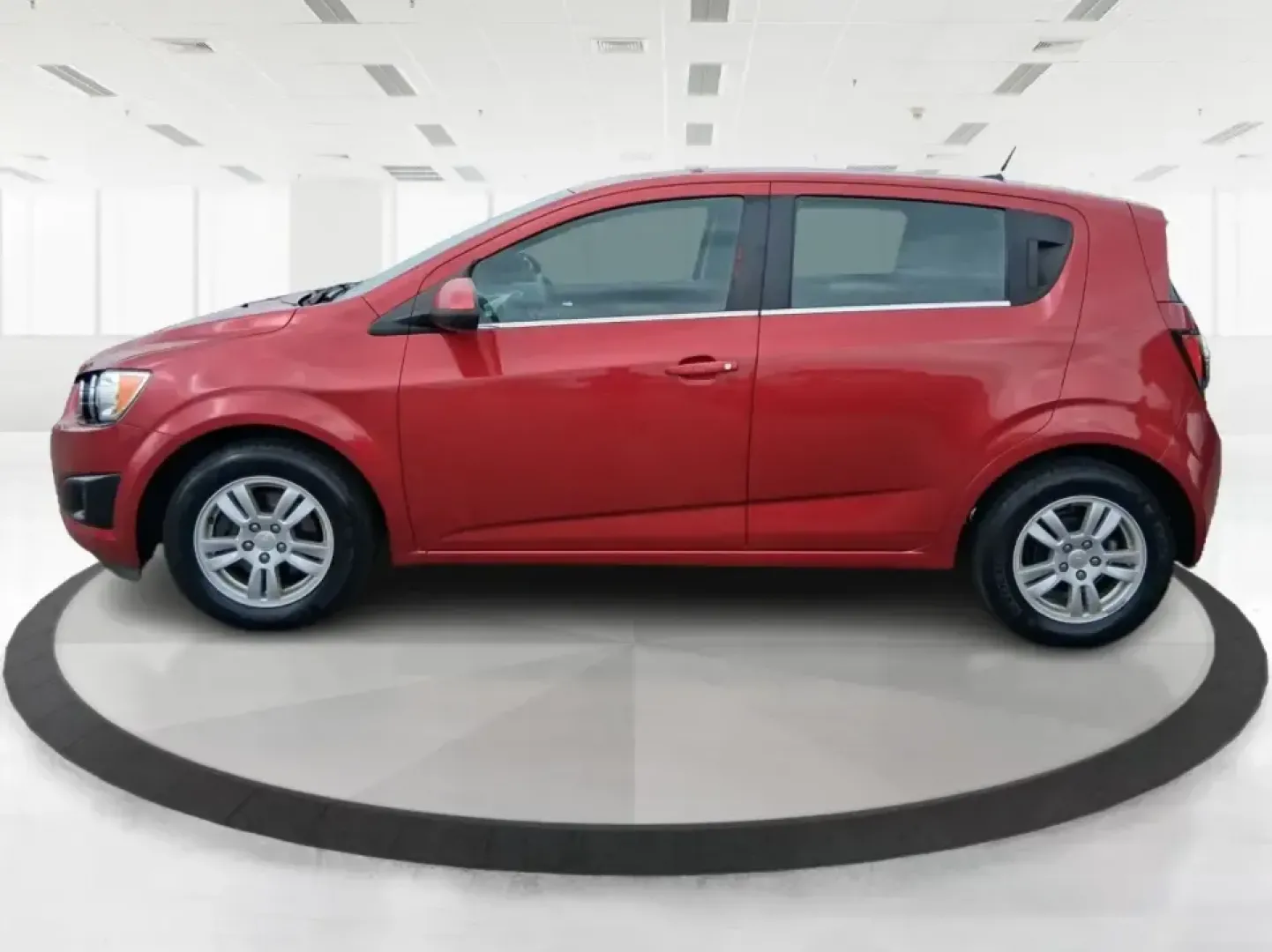 2014 Chevrolet Sonic LT Auto (1G1JC6SH7E4) with an 1.8L L4 DOHC 24V engine, 6-Speed Automatic transmission, located at 1230 East Main St, Xenia, OH, 45385, (937) 908-9800, 39.688026, -83.910172 - Need a smart, easy-to-park commuter that still has room for grocery runs, school backpacks, and weekend getaways to Dayton or the Miami Valley? This 2014 Chevrolet Sonic LT Auto Hatchback delivers the kind of real-world versatility that fits everyday life in Troy-zippy around town, efficient for lon - Photo#5