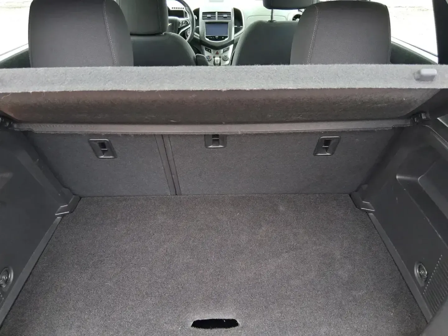 2014 Chevrolet Sonic LT Auto (1G1JC6SH7E4) with an 1.8L L4 DOHC 24V engine, 6-Speed Automatic transmission, located at 1230 East Main St, Xenia, OH, 45385, (937) 908-9800, 39.688026, -83.910172 - Need a smart, easy-to-park commuter that still has room for grocery runs, school backpacks, and weekend getaways to Dayton or the Miami Valley? This 2014 Chevrolet Sonic LT Auto Hatchback delivers the kind of real-world versatility that fits everyday life in Troy-zippy around town, efficient for lon - Photo#12