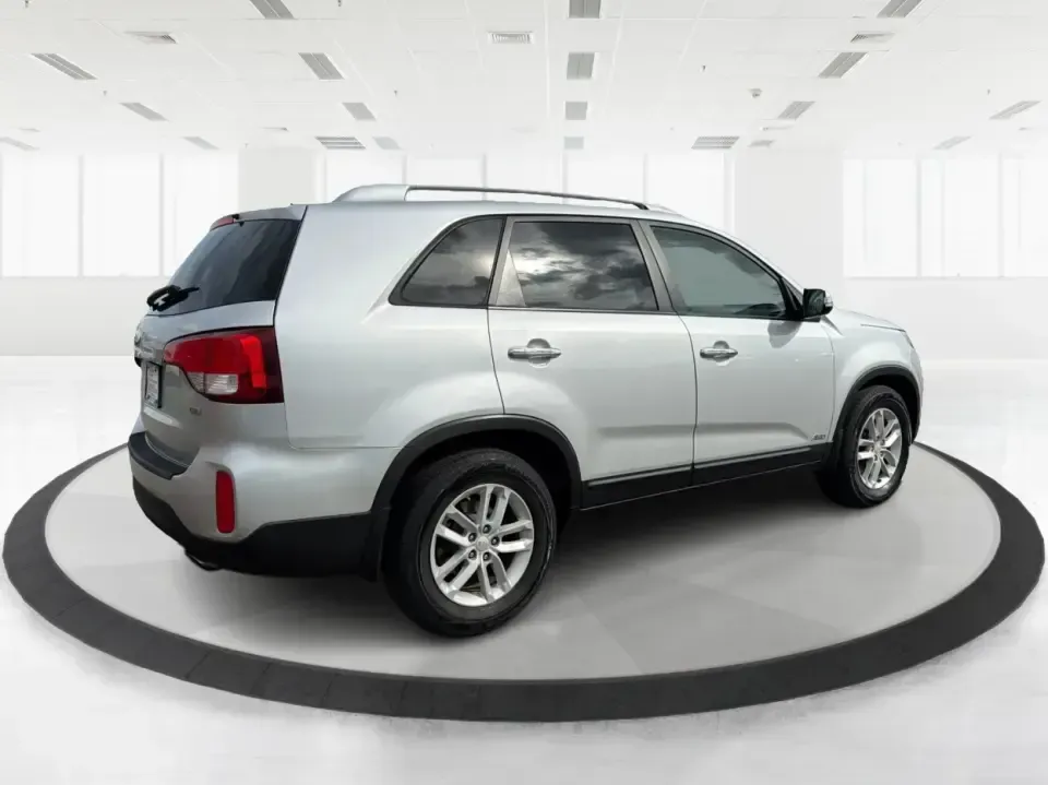 2014 Kia Sorento LX V6 (5XYKTDA74EG) with an Lambda II 3.3L V-6 gasoline direct injection engine, 6-Speed Automatic transmission, located at 8750 N County Rd 25A, Piqua, OH, 45356, (937) 908-9800, 40.164391, -84.232513 - Picture your next Ohio weekend: the kids loaded up for a day at Johnston Farm and Indian Agency, groceries stowed for the week, and enough power on tap to handle I75 merges without breaking a sweat. This 2014 Kia Sorento LX V6 in Bright Silver is the kind of do-it-all SUV that fits real life in Pi - Photo#2