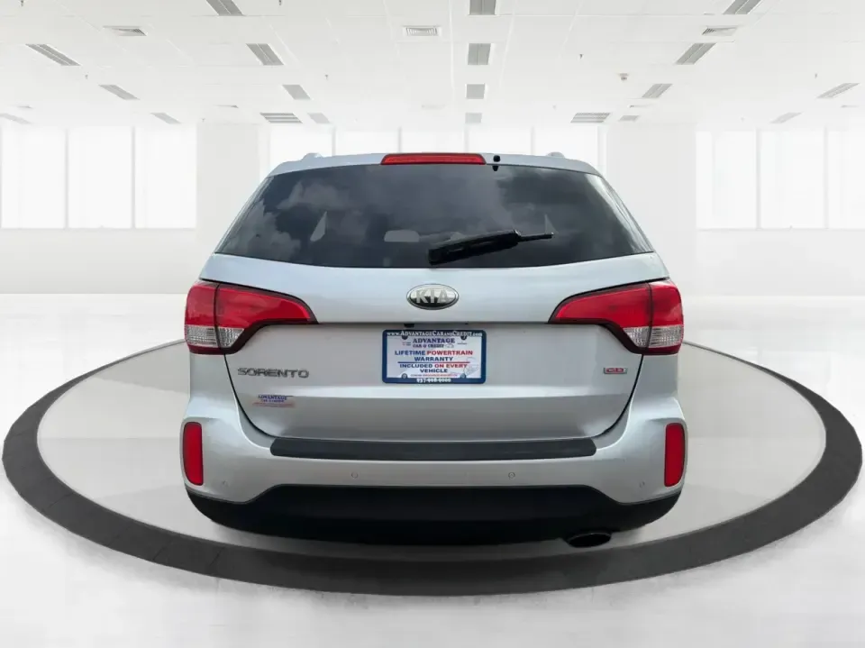 2014 Kia Sorento LX V6 (5XYKTDA74EG) with an Lambda II 3.3L V-6 gasoline direct injection engine, 6-Speed Automatic transmission, located at 8750 N County Rd 25A, Piqua, OH, 45356, (937) 908-9800, 40.164391, -84.232513 - Picture your next Ohio weekend: the kids loaded up for a day at Johnston Farm and Indian Agency, groceries stowed for the week, and enough power on tap to handle I75 merges without breaking a sweat. This 2014 Kia Sorento LX V6 in Bright Silver is the kind of do-it-all SUV that fits real life in Pi - Photo#3