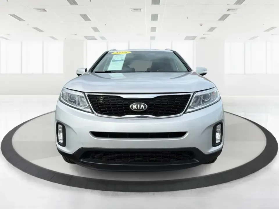 2014 Kia Sorento LX V6 (5XYKTDA74EG) with an Lambda II 3.3L V-6 gasoline direct injection engine, 6-Speed Automatic transmission, located at 8750 N County Rd 25A, Piqua, OH, 45356, (937) 908-9800, 40.164391, -84.232513 - Picture your next Ohio weekend: the kids loaded up for a day at Johnston Farm and Indian Agency, groceries stowed for the week, and enough power on tap to handle I75 merges without breaking a sweat. This 2014 Kia Sorento LX V6 in Bright Silver is the kind of do-it-all SUV that fits real life in Pi - Photo#7
