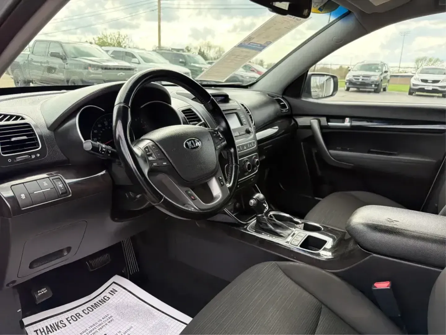 2014 Kia Sorento LX V6 (5XYKTDA74EG) with an Lambda II 3.3L V-6 gasoline direct injection engine, 6-Speed Automatic transmission, located at 8750 N County Rd 25A, Piqua, OH, 45356, (937) 908-9800, 40.164391, -84.232513 - Picture your next Ohio weekend: the kids loaded up for a day at Johnston Farm and Indian Agency, groceries stowed for the week, and enough power on tap to handle I75 merges without breaking a sweat. This 2014 Kia Sorento LX V6 in Bright Silver is the kind of do-it-all SUV that fits real life in Pi - Photo#9