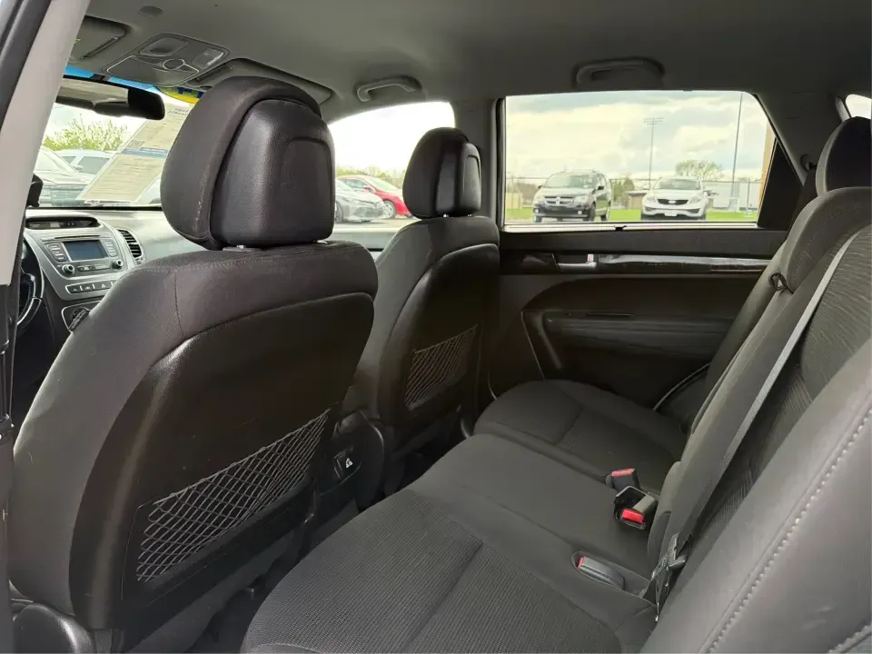 2014 Kia Sorento LX V6 (5XYKTDA74EG) with an Lambda II 3.3L V-6 gasoline direct injection engine, 6-Speed Automatic transmission, located at 8750 N County Rd 25A, Piqua, OH, 45356, (937) 908-9800, 40.164391, -84.232513 - Picture your next Ohio weekend: the kids loaded up for a day at Johnston Farm and Indian Agency, groceries stowed for the week, and enough power on tap to handle I75 merges without breaking a sweat. This 2014 Kia Sorento LX V6 in Bright Silver is the kind of do-it-all SUV that fits real life in Pi - Photo#10