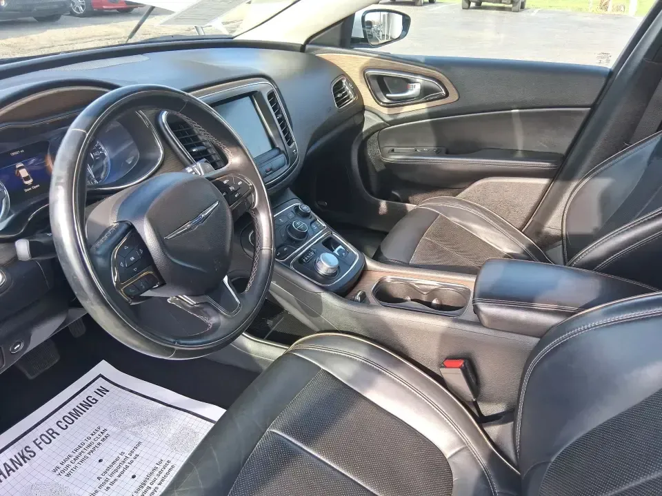 2015 Chrysler 200 C (1C3CCCCG6FN) with an 3.6L V6 DOHC 24V FFV engine, 9-Speed Automatic transmission, located at 8750 N County Rd 25A, Piqua, OH, 45356, (937) 908-9800, 40.164391, -84.232513 - Need a dependable sedan for the daily commute up I75, quick school drop-offs, or a comfortable weekend drive to downtown Piqua and the Great Miami River Trail? This 2015 Chrysler 200 C is the kind of practical-yet-upgraded ride that fits real life-quiet on longer trips, easy to park around local sho - Photo#9