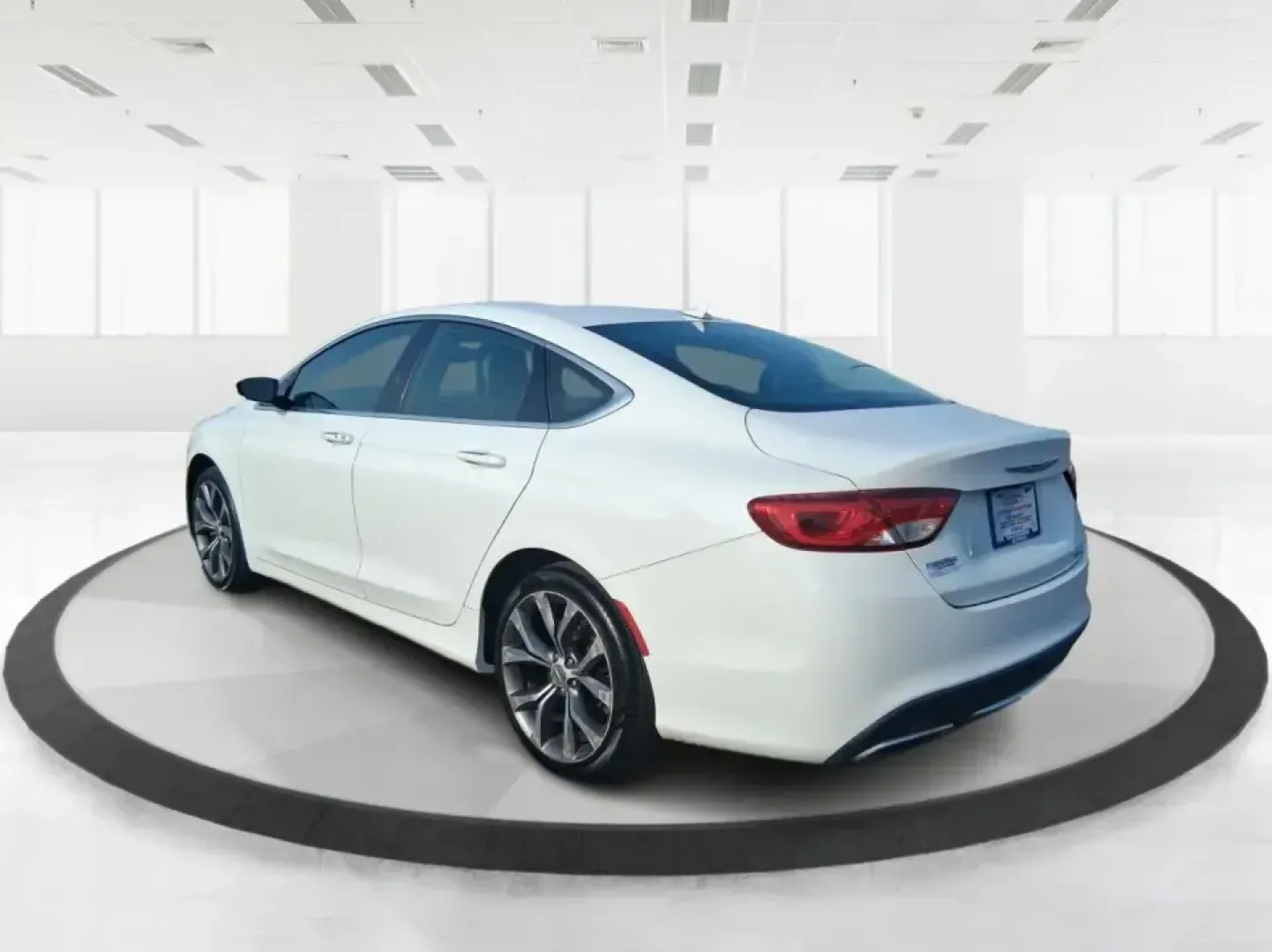 2015 Chrysler 200 C (1C3CCCCG6FN) with an 3.6L V6 DOHC 24V FFV engine, 9-Speed Automatic transmission, located at 4508 South Dixie Dr, Moraine, OH, 45439, (937) 908-9800, 39.689976, -84.218452 - Need a dependable sedan for the daily commute up I75, quick school drop-offs, or a comfortable weekend drive to downtown Piqua and the Great Miami River Trail? This 2015 Chrysler 200 C is the kind of practical-yet-upgraded ride that fits real life-quiet on longer trips, easy to park around local sho - Photo#4