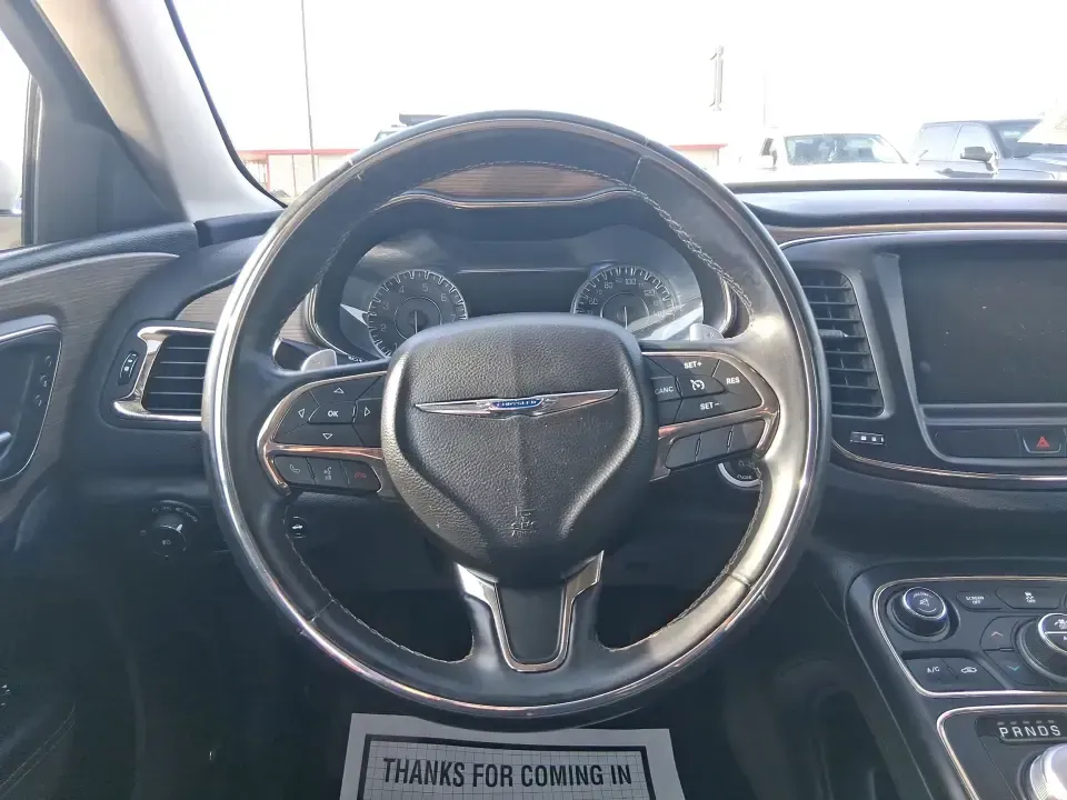 2015 Chrysler 200 C (1C3CCCCG6FN) with an 3.6L V6 DOHC 24V FFV engine, 9-Speed Automatic transmission, located at 4508 South Dixie Dr, Moraine, OH, 45439, (937) 908-9800, 39.689976, -84.218452 - Need a dependable sedan for the daily commute up I75, quick school drop-offs, or a comfortable weekend drive to downtown Piqua and the Great Miami River Trail? This 2015 Chrysler 200 C is the kind of practical-yet-upgraded ride that fits real life-quiet on longer trips, easy to park around local sho - Photo#16