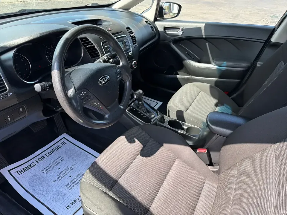 2018 Kia Forte LX (3KPFK4A79JE) with an 2L I-4 DOHC engine, 6M transmission, located at 4508 South Dixie Dr, Moraine, OH, 45439, (937) 908-9800, 39.689976, -84.218452 - Need a dependable commuter that's easy to park downtown, comfortable for I-75 and SR-725 traffic, and still stylish enough for dinner in the Dayton area? This 2018 Kia Forte LX in Aurora Black is a smart, budget-friendly sedan that fits real life in Moraine, OH-whether you're stacking miles for work - Photo#9