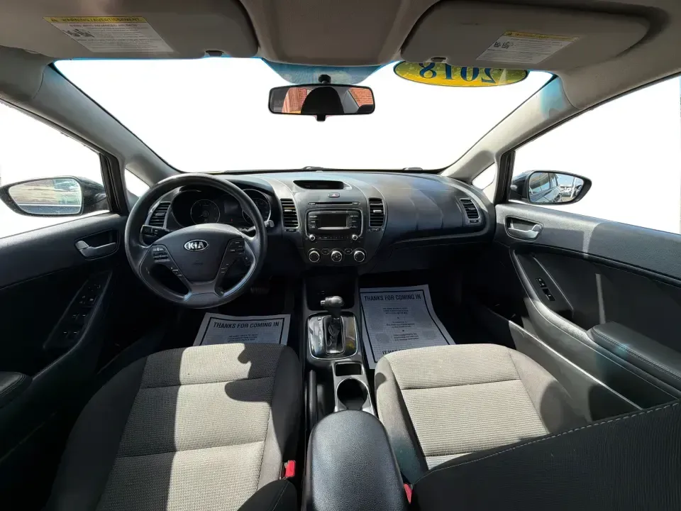 2018 Kia Forte LX (3KPFK4A79JE) with an 2L I-4 DOHC engine, 6M transmission, located at 4508 South Dixie Dr, Moraine, OH, 45439, (937) 908-9800, 39.689976, -84.218452 - Need a dependable commuter that's easy to park downtown, comfortable for I-75 and SR-725 traffic, and still stylish enough for dinner in the Dayton area? This 2018 Kia Forte LX in Aurora Black is a smart, budget-friendly sedan that fits real life in Moraine, OH-whether you're stacking miles for work - Photo#21