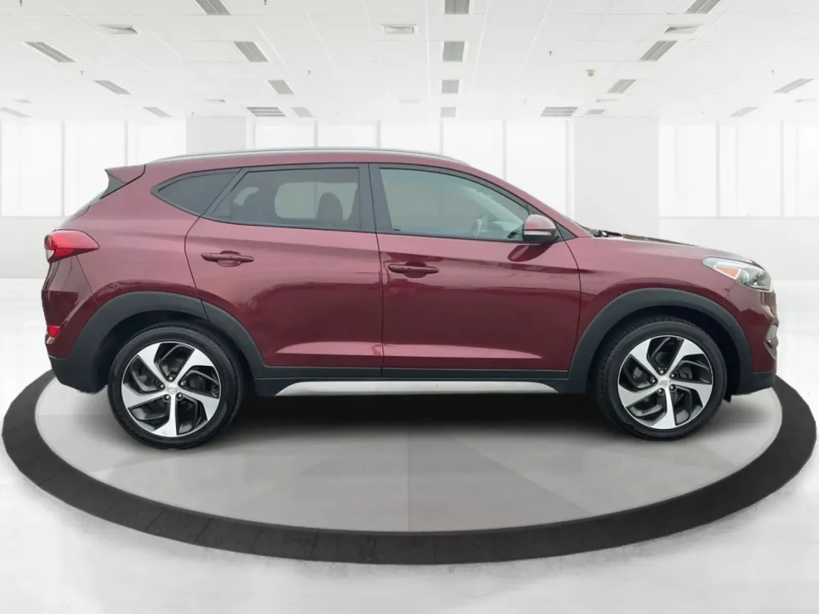 2017 Hyundai Tucson Sport (KM8J3CA29HU) with an 1.6L I-4 gasoline direct injection engine, located at 1099 N County Rd 25A , Troy, OH, 45373, (937) 908-9800, 40.057079, -84.212883 - **Discover Adventure in the 2017 Hyundai Tucson: Your Ideal SUV for Every Journey!**<br /> <br /> Are you ready to elevate your driving experience? The 2017 Hyundai Tucson in striking Ruby Wine is here, tailored for those who crave versatility and reliability in their daily adventures. Whether you'r - Photo#1