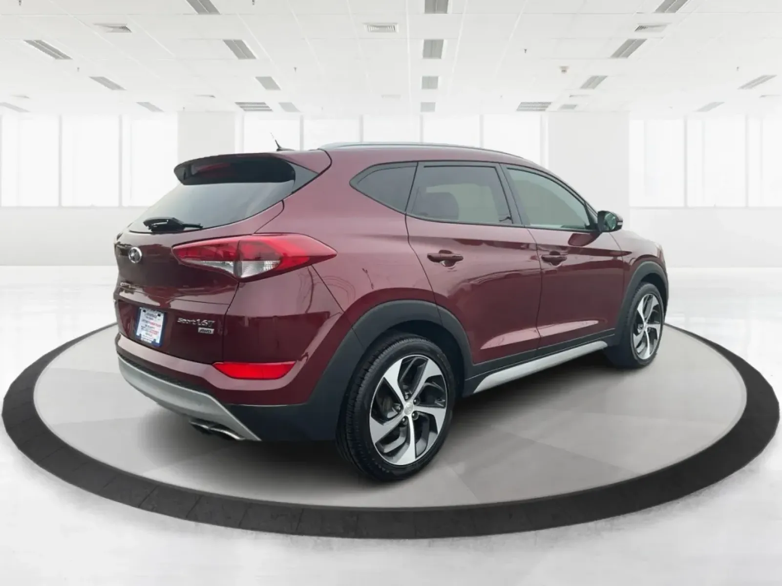 2017 Hyundai Tucson Sport (KM8J3CA29HU) with an 1.6L I-4 gasoline direct injection engine, located at 1099 N County Rd 25A , Troy, OH, 45373, (937) 908-9800, 40.057079, -84.212883 - **Discover Adventure in the 2017 Hyundai Tucson: Your Ideal SUV for Every Journey!**<br /> <br /> Are you ready to elevate your driving experience? The 2017 Hyundai Tucson in striking Ruby Wine is here, tailored for those who crave versatility and reliability in their daily adventures. Whether you'r - Photo#2