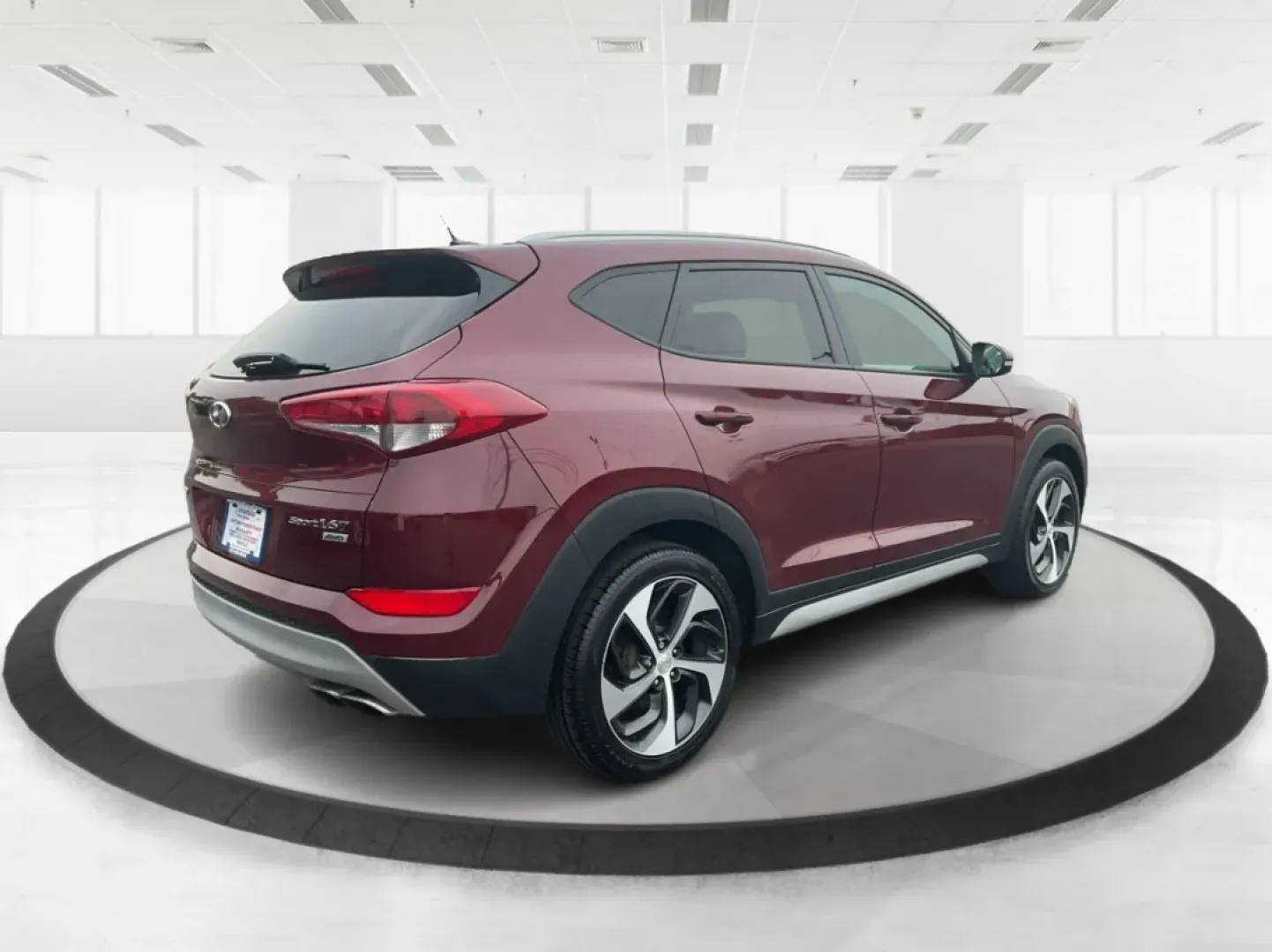 2017 Hyundai Tucson Sport (KM8J3CA29HU) with an 1.6L I-4 gasoline direct injection engine, located at 401 Woodman Dr, Riverside, OH, 45431, (937) 908-9800, 39.760899, -84.123421 - **Discover Adventure in the 2017 Hyundai Tucson: Your Ideal SUV for Every Journey!**<br /> <br /> Are you ready to elevate your driving experience? The 2017 Hyundai Tucson in striking Ruby Wine is here, tailored for those who crave versatility and reliability in their daily adventures. Whether you'r - Photo#2