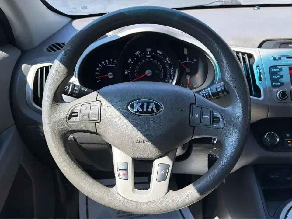 2014 Kia Sportage LX (KNDPBCAC6E7) with an 2.4L V6 DOHC 24V engine, 6-Speed Automatic transmission, located at 1230 East Main St, Xenia, OH, 45385, (937) 908-9800, 39.688026, -83.910172 - **Adventure Awaits: 2014 Kia Sportage LX Ready for Your Next Journey!**<br /> <br /> Are you in search of a reliable vehicle that combines style, comfort, and versatility? Look no further than this 2014 Kia Sportage LX, perfect for weekend getaways, family road trips, or daily commutes. This crossov - Photo#16
