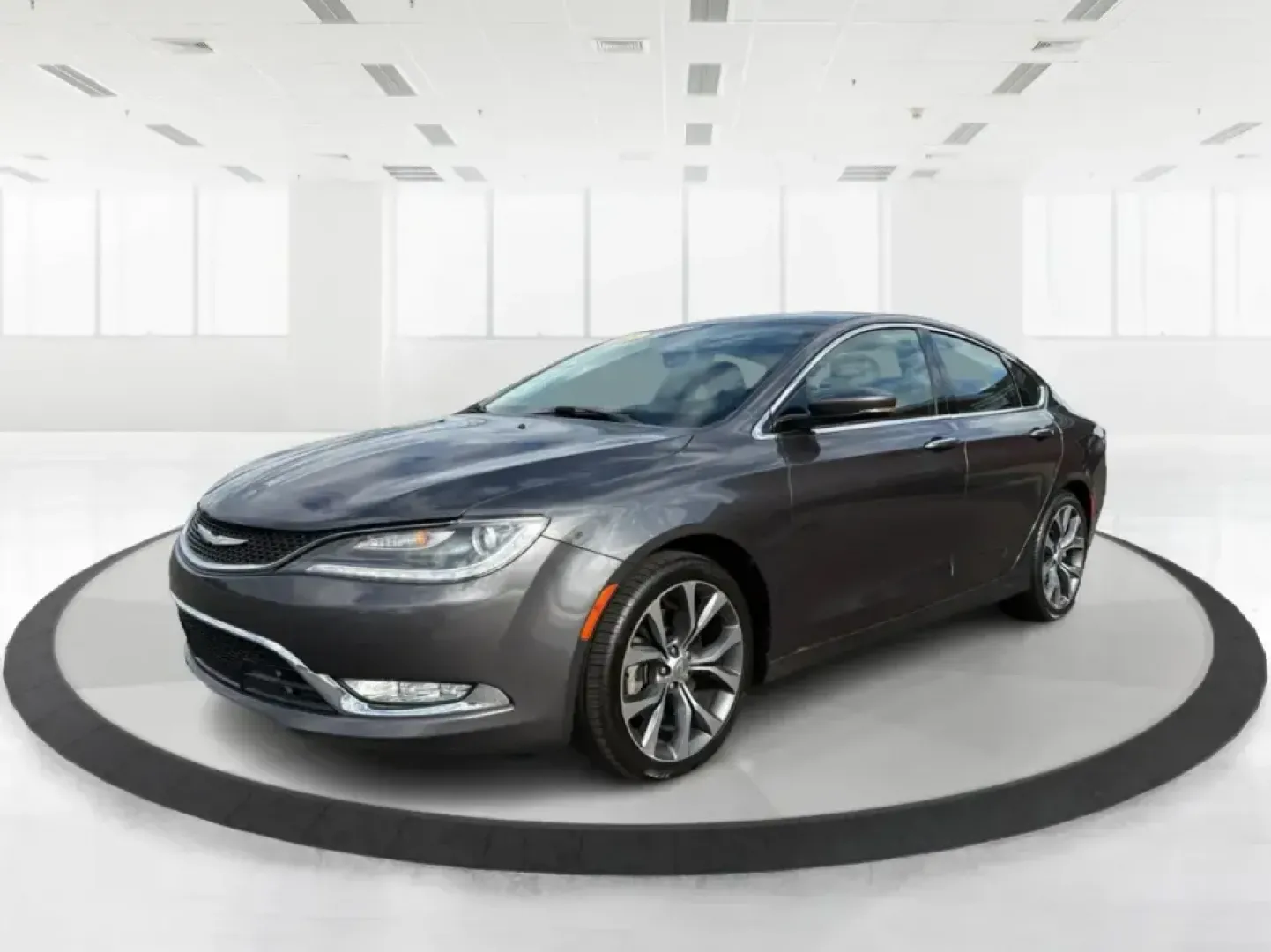 2015 Chrysler 200 C (1C3CCCCG7FN) with an 3.6L V6 DOHC 24V FFV engine, 9-Speed Automatic transmission, located at 880 E. National Road, Vandalia, OH, 45377, (937) 908-9800, 39.891918, -84.183594 - Set up for real life in the Miami Valley-school drop-offs, a long commute down I75, and comfortable weekend getaways-this 2015 Chrysler 200 C is the kind of midsize sedan that fits a busy schedule without feeling basic. With its smooth ride, strong V6 power, and upscale comfort features, it's a smar - Photo#8