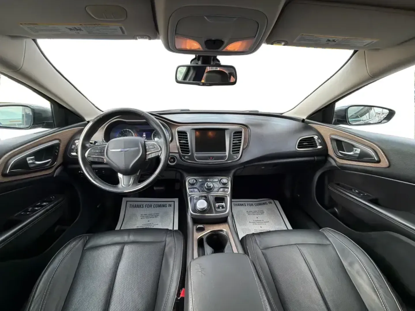 2015 Chrysler 200 C (1C3CCCCG7FN) with an 3.6L V6 DOHC 24V FFV engine, 9-Speed Automatic transmission, located at 880 E. National Road, Vandalia, OH, 45377, (937) 908-9800, 39.891918, -84.183594 - Set up for real life in the Miami Valley-school drop-offs, a long commute down I75, and comfortable weekend getaways-this 2015 Chrysler 200 C is the kind of midsize sedan that fits a busy schedule without feeling basic. With its smooth ride, strong V6 power, and upscale comfort features, it's a smar - Photo#21