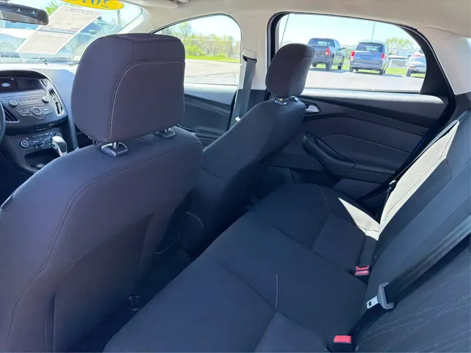 2018 Ford Focus SE (1FADP3FE5JL) with an 1.0L L3 engine, Automatic transmission, located at 1230 East Main St, Xenia, OH, 45385, (937) 908-9800, 39.688026, -83.910172 - Need a smart, budget-friendly commuter that's easy to live with all week and still ready for a spontaneous weekend escape? This 2018 Ford Focus SE sedan in eye-catching Lightning Blue Metallic is a practical pick for daily drives to Dayton, school drop-offs, and quick errands around Xenia-while keep - Photo#10