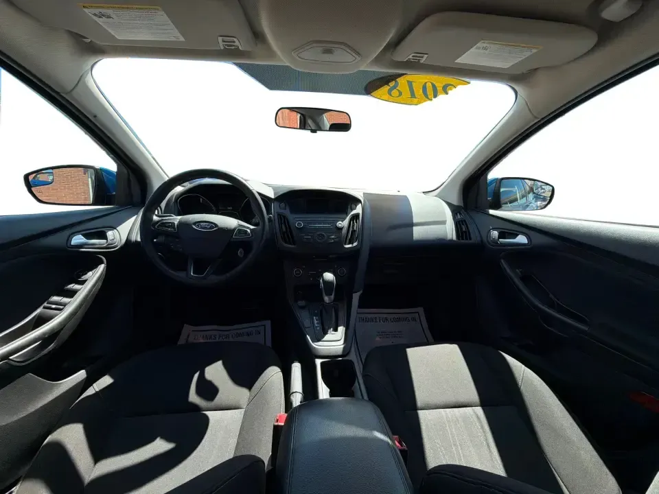2018 Ford Focus SE (1FADP3FE5JL) with an 1.0L L3 engine, Automatic transmission, located at 1230 East Main St, Xenia, OH, 45385, (937) 908-9800, 39.688026, -83.910172 - Need a smart, budget-friendly commuter that's easy to live with all week and still ready for a spontaneous weekend escape? This 2018 Ford Focus SE sedan in eye-catching Lightning Blue Metallic is a practical pick for daily drives to Dayton, school drop-offs, and quick errands around Xenia-while keep - Photo#21