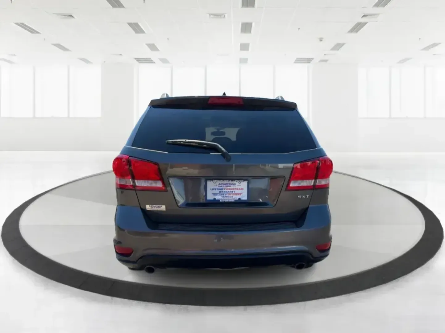 2014 Dodge Journey SXT (3C4PDDBG0ET) with an 3.6L V-6 DOHC engine, 6-Speed Automatic transmission, located at 1099 N County Rd 25A , Troy, OH, 45373, (937) 908-9800, 40.057079, -84.212883 - Pack up the kids, the dog, and the weekend bags-this 2014 Dodge Journey SXT is the kind of SUV that makes everyday life in Troy easier and spontaneous road trips feel completely doable. Whether you're tackling school drop-offs, commuting to Dayton, or planning a family day at the Miami County Fairgr - Photo#3