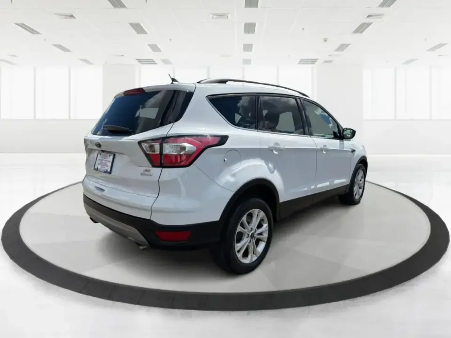2018 Ford Escape SE (1FMCU0GD2JU) with an 1.5L L4 DOHC 16V engine, 6A transmission, located at 1951 S Dayton Lakeview Rd., New Carlisle, OH, 45344, (937) 908-9800, 39.890999, -84.050255 - Picture your next easy-to-live-with SUV: something that handles weekday commutes down I70, last-minute grocery runs near Brandt Pike, and weekend getaways to Buck Creek State Park without draining your budget. This 2018 Ford Escape SE is built for real life in Clark County-comfortable, efficient, an - Photo#2