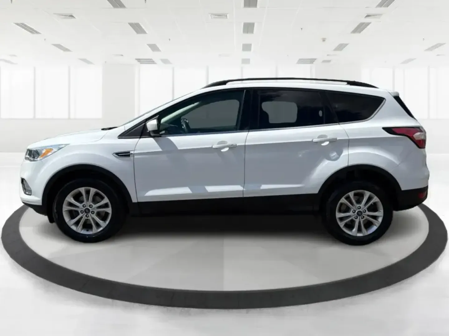 2018 Ford Escape SE (1FMCU0GD2JU) with an 1.5L L4 DOHC 16V engine, 6A transmission, located at 1951 S Dayton Lakeview Rd., New Carlisle, OH, 45344, (937) 908-9800, 39.890999, -84.050255 - Picture your next easy-to-live-with SUV: something that handles weekday commutes down I70, last-minute grocery runs near Brandt Pike, and weekend getaways to Buck Creek State Park without draining your budget. This 2018 Ford Escape SE is built for real life in Clark County-comfortable, efficient, an - Photo#5