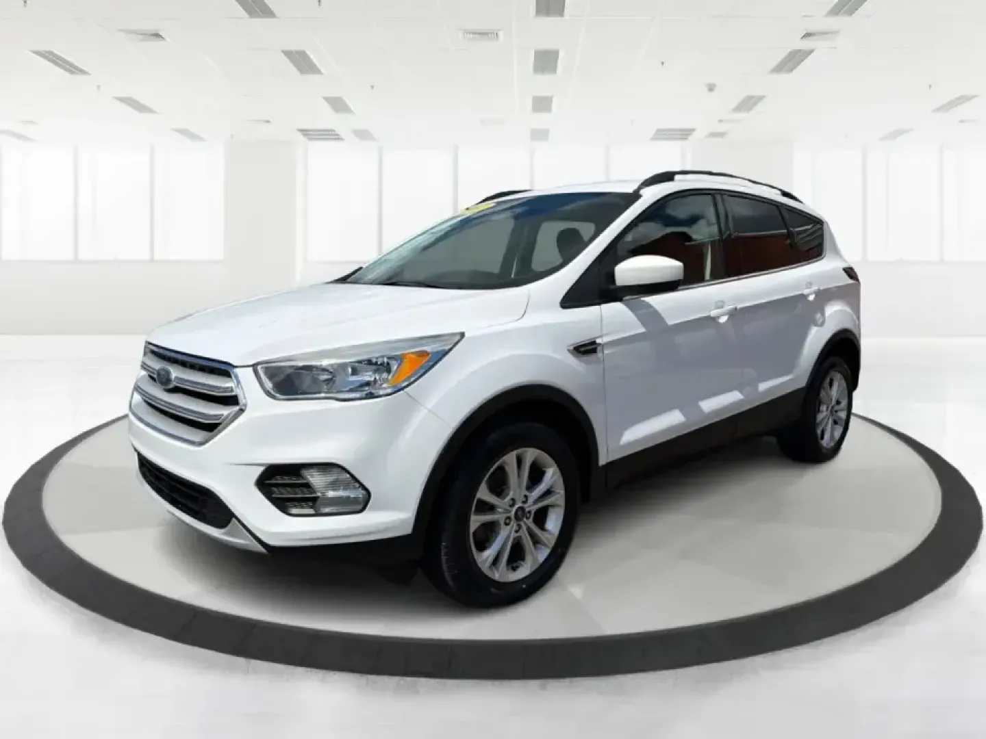 2018 Ford Escape SE (1FMCU0GD2JU) with an 1.5L L4 DOHC 16V engine, 6A transmission, located at 1951 S Dayton Lakeview Rd., New Carlisle, OH, 45344, (937) 908-9800, 39.890999, -84.050255 - Picture your next easy-to-live-with SUV: something that handles weekday commutes down I70, last-minute grocery runs near Brandt Pike, and weekend getaways to Buck Creek State Park without draining your budget. This 2018 Ford Escape SE is built for real life in Clark County-comfortable, efficient, an - Photo#8