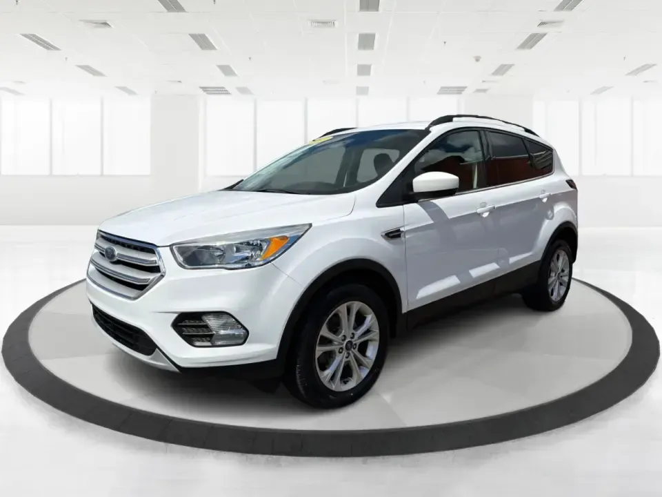 2018 Ford Escape SE (1FMCU0GD2JU) with an 1.5L L4 DOHC 16V engine, 6A transmission, located at 1951 S Dayton Lakeview Rd., New Carlisle, OH, 45344, (937) 908-9800, 39.890999, -84.050255 - Picture your next easy-to-live-with SUV: something that handles weekday commutes down I70, last-minute grocery runs near Brandt Pike, and weekend getaways to Buck Creek State Park without draining your budget. This 2018 Ford Escape SE is built for real life in Clark County-comfortable, efficient, an - Photo#8