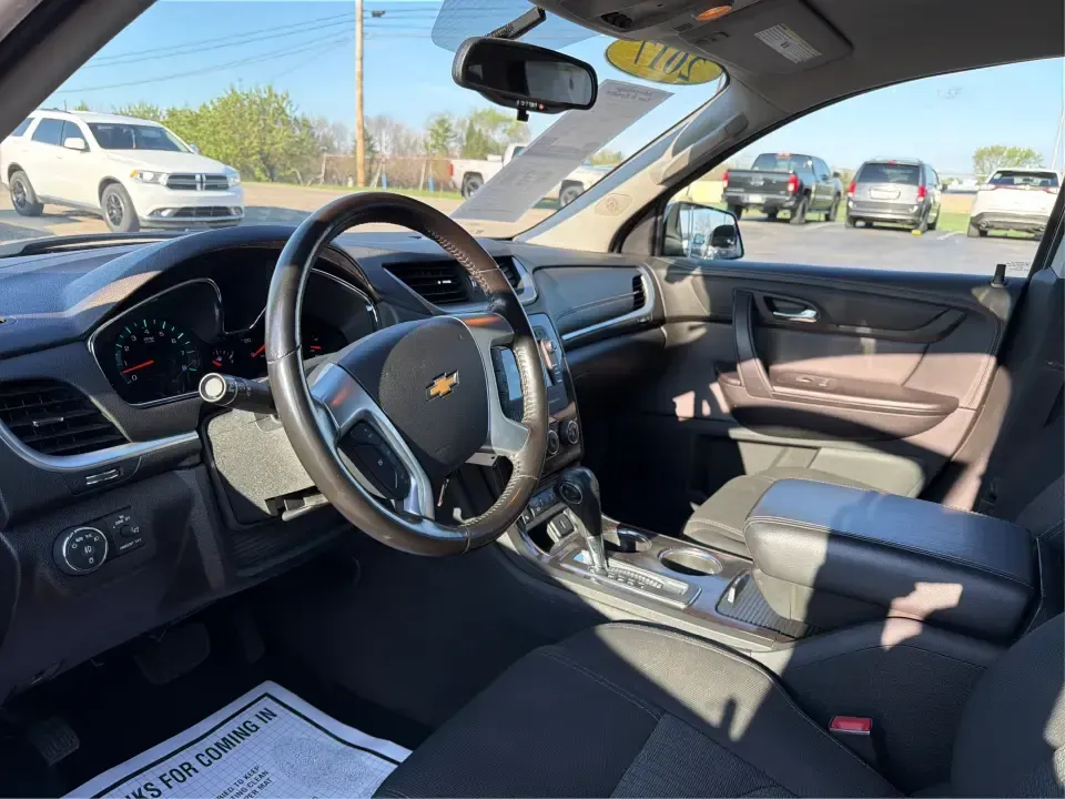 2017 Chevrolet Traverse 1LT (1GNKRGKD6HJ) with an 3.6L V-6 gasoline direct injection engine, 6A transmission, located at 8750 N County Rd 25A, Piqua, OH, 45356, (937) 908-9800, 40.164391, -84.232513 - Road trips to Indian Lake, busy school mornings, and comfortable daily commutes down I75 are exactly what this SUV was built for. If you need a three-row family hauler that still feels confident and composed on Ohio back roads, this **2017 Chevrolet Traverse 1LT** in **Tungsten Metallic** delivers t - Photo#9