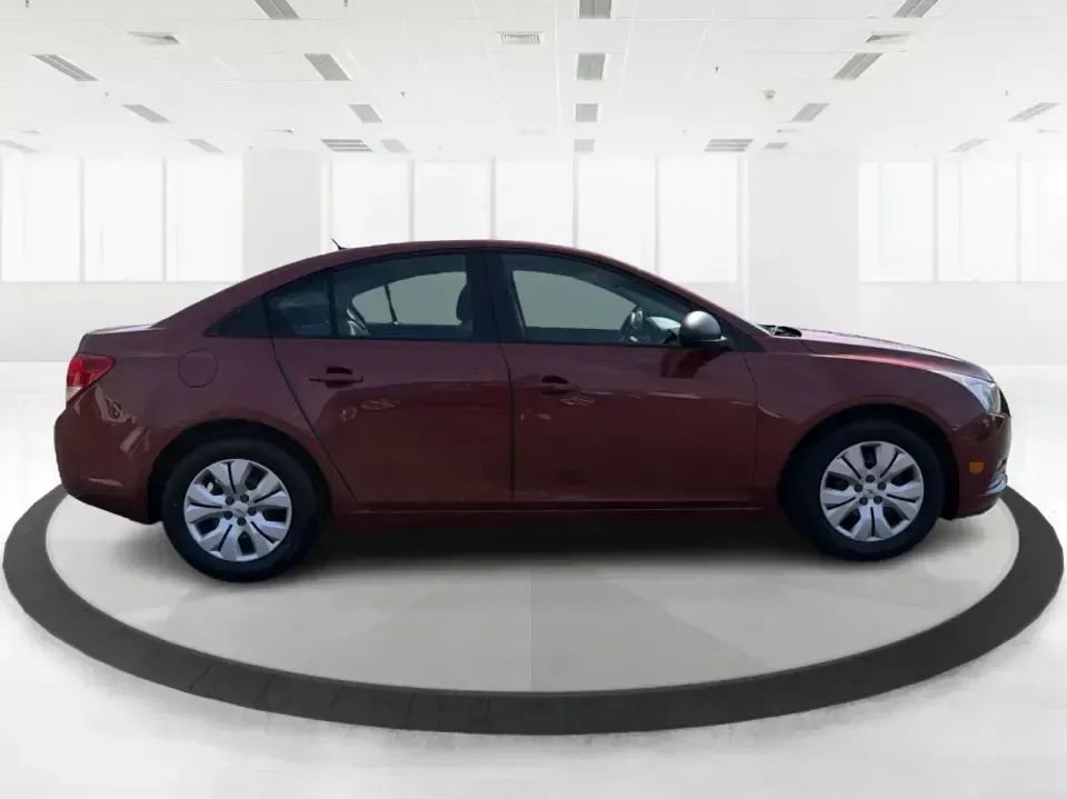 2013 Chevrolet Cruze LS Auto (1G1PA5SG2D7) with an ECOTEC 1.8L I-4 DOHC engine, 6-Speed Automatic transmission, located at 1230 East Main St, Xenia, OH, 45385, (937) 908-9800, 39.688026, -83.910172 - Need a dependable commuter that sips fuel, fits into tight downtown parking, and still feels comfortable for weekend errands and road trips? This 2013 Chevrolet Cruze LS Auto is a smart, budget-friendly sedan for life in and around Xenia-whether you're commuting toward Dayton, heading to Wright-Patt - Photo#1