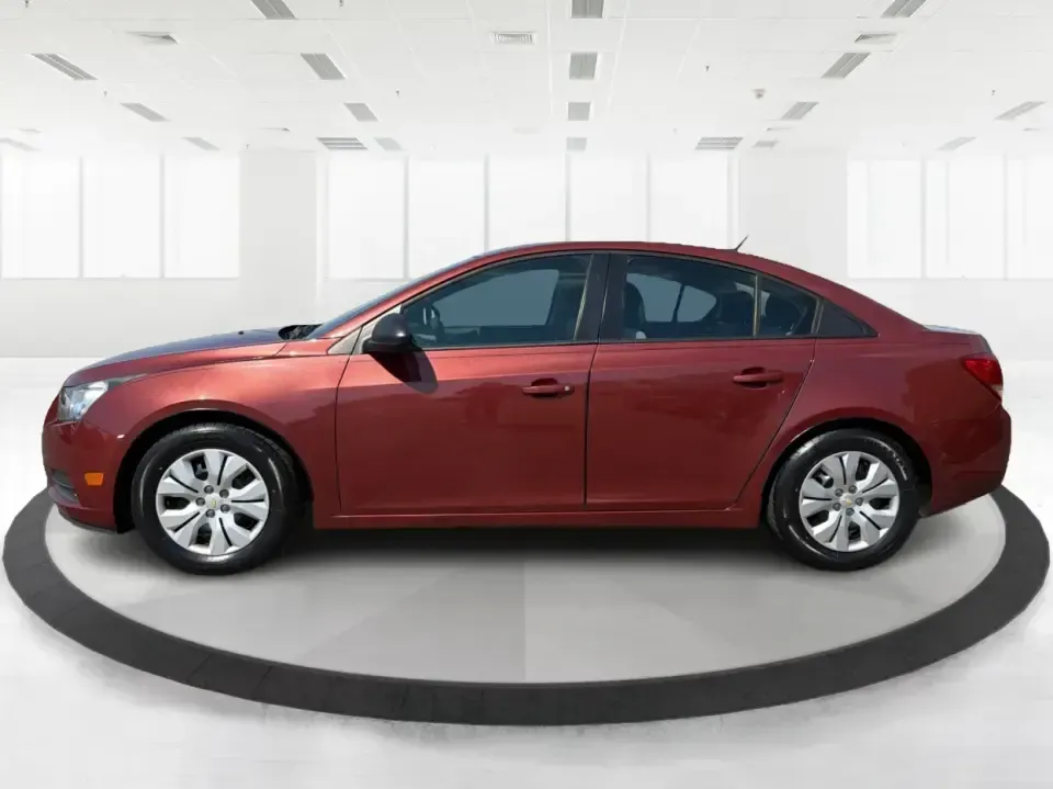 2013 Chevrolet Cruze LS Auto (1G1PA5SG2D7) with an ECOTEC 1.8L I-4 DOHC engine, 6-Speed Automatic transmission, located at 1230 East Main St, Xenia, OH, 45385, (937) 908-9800, 39.688026, -83.910172 - Need a dependable commuter that sips fuel, fits into tight downtown parking, and still feels comfortable for weekend errands and road trips? This 2013 Chevrolet Cruze LS Auto is a smart, budget-friendly sedan for life in and around Xenia-whether you're commuting toward Dayton, heading to Wright-Patt - Photo#5