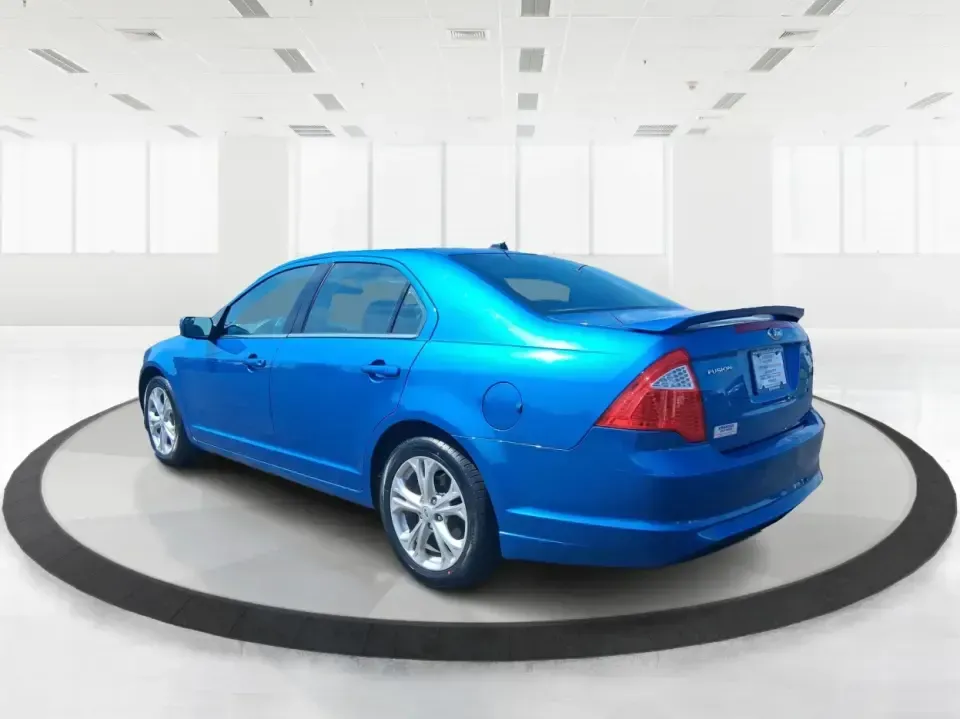 2012 Ford Fusion SE (3FAHP0HAXCR) with an 2.5L L4 DOHC 16V engine, located at 1099 N County Rd 25A , Troy, OH, 45373, (937) 908-9800, 40.057079, -84.212883 - Need a dependable sedan that makes everyday life easier-whether you're commuting down I-75 to Dayton, running errands around Troy, or planning a weekend drive past the Miami River and downtown's shops and festivals? This 2012 Ford Fusion SE in Blue Flame Metallic is a smart, comfortable choice for b - Photo#4