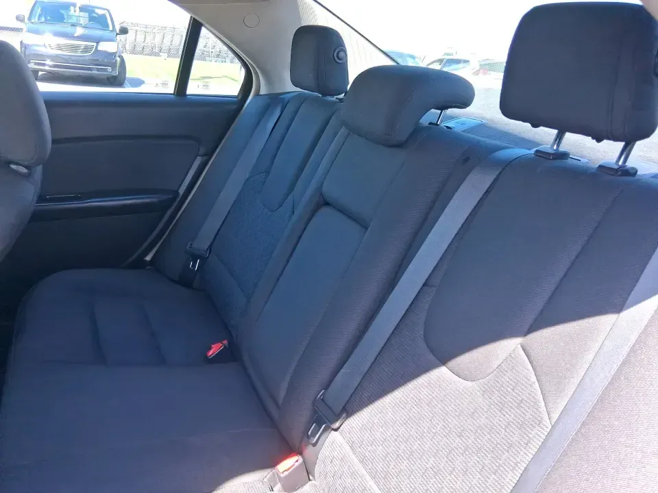 2012 Ford Fusion SE (3FAHP0HAXCR) with an 2.5L L4 DOHC 16V engine, located at 1099 N County Rd 25A , Troy, OH, 45373, (937) 908-9800, 40.057079, -84.212883 - Need a dependable sedan that makes everyday life easier-whether you're commuting down I-75 to Dayton, running errands around Troy, or planning a weekend drive past the Miami River and downtown's shops and festivals? This 2012 Ford Fusion SE in Blue Flame Metallic is a smart, comfortable choice for b - Photo#10