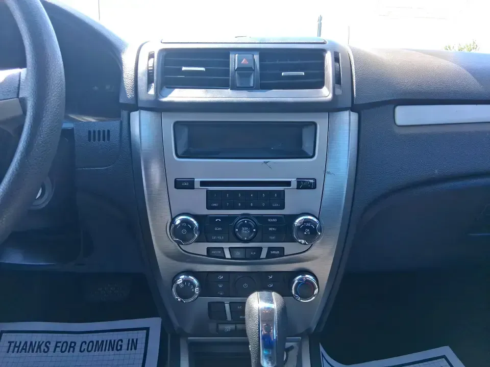 2012 Ford Fusion SE (3FAHP0HAXCR) with an 2.5L L4 DOHC 16V engine, located at 1099 N County Rd 25A , Troy, OH, 45373, (937) 908-9800, 40.057079, -84.212883 - Need a dependable sedan that makes everyday life easier-whether you're commuting down I-75 to Dayton, running errands around Troy, or planning a weekend drive past the Miami River and downtown's shops and festivals? This 2012 Ford Fusion SE in Blue Flame Metallic is a smart, comfortable choice for b - Photo#13