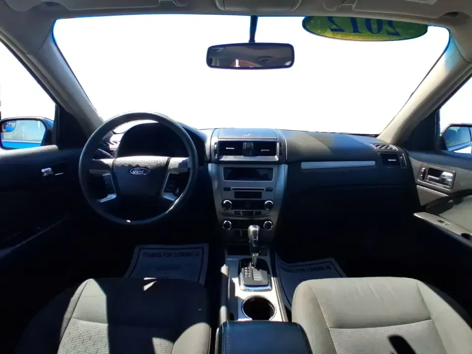 2012 Ford Fusion SE (3FAHP0HAXCR) with an 2.5L L4 DOHC 16V engine, located at 1099 N County Rd 25A , Troy, OH, 45373, (937) 908-9800, 40.057079, -84.212883 - Need a dependable sedan that makes everyday life easier-whether you're commuting down I-75 to Dayton, running errands around Troy, or planning a weekend drive past the Miami River and downtown's shops and festivals? This 2012 Ford Fusion SE in Blue Flame Metallic is a smart, comfortable choice for b - Photo#21