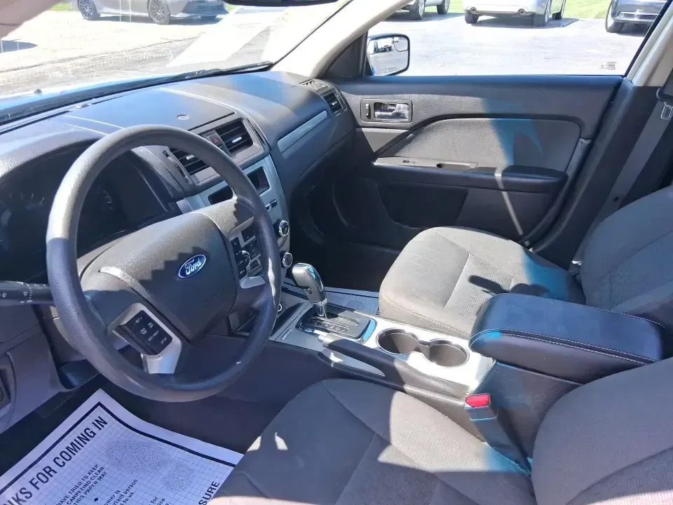 2012 Ford Fusion SE (3FAHP0HAXCR) with an 2.5L L4 DOHC 16V engine, located at 1230 East Main St, Xenia, OH, 45385, (937) 908-9800, 39.688026, -83.910172 - Need a dependable sedan that makes everyday life easier-whether you're commuting down I-75 to Dayton, running errands around Troy, or planning a weekend drive past the Miami River and downtown's shops and festivals? This 2012 Ford Fusion SE in Blue Flame Metallic is a smart, comfortable choice for b - Photo#9