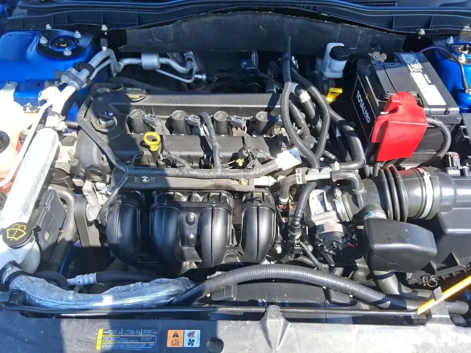 2012 Ford Fusion SE (3FAHP0HAXCR) with an 2.5L L4 DOHC 16V engine, located at 1230 East Main St, Xenia, OH, 45385, (937) 908-9800, 39.688026, -83.910172 - Need a dependable sedan that makes everyday life easier-whether you're commuting down I-75 to Dayton, running errands around Troy, or planning a weekend drive past the Miami River and downtown's shops and festivals? This 2012 Ford Fusion SE in Blue Flame Metallic is a smart, comfortable choice for b - Photo#11