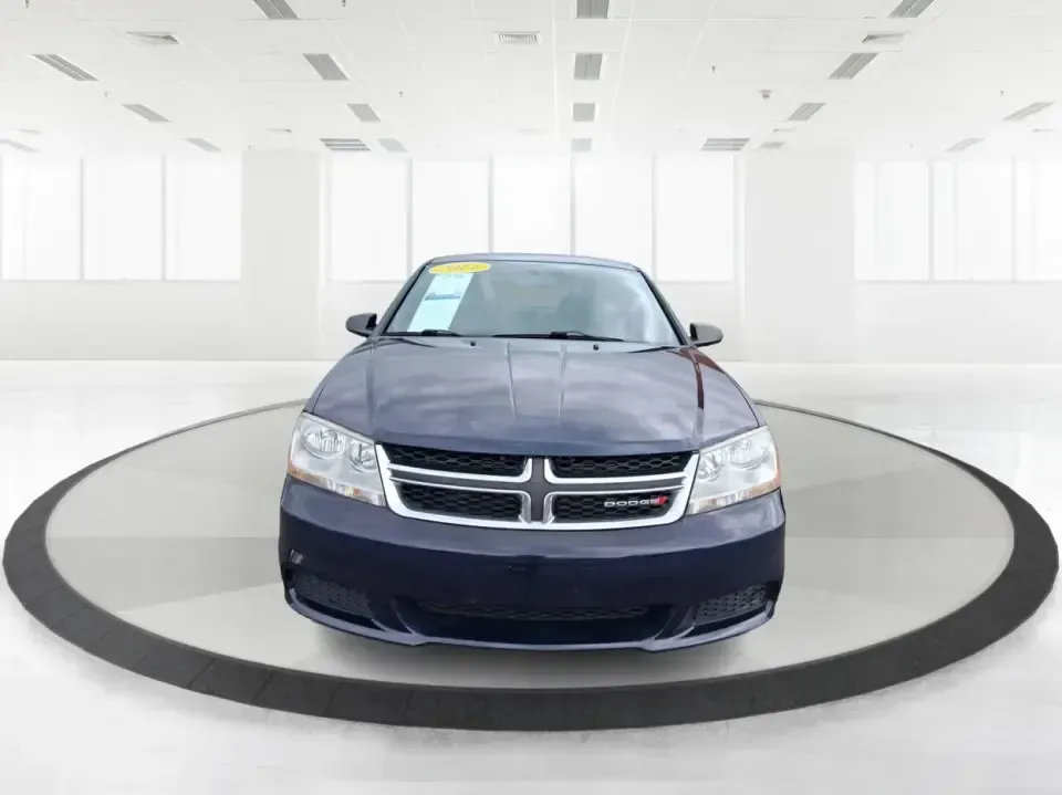 2014 Dodge Avenger SE (1C3CDZAG6EN) with an 3.6L V6 DOHC 24V FFV engine, 6-Speed Automatic transmission, located at 880 E. National Road, Vandalia, OH, 45377, (937) 908-9800, 39.891918, -84.183594 - Need a dependable commuter that still feels fun on I75, roomy enough for family errands, and confident for weekend drives to the National Museum of the U.S. Air Force? This 2014 Dodge Avenger SE in eye-catching True Blue Pearlcoat delivers the kind of real-world versatility Vandalia drivers want-com - Photo#7