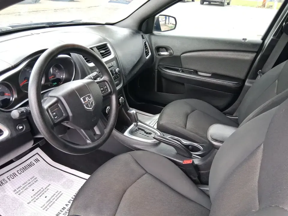 2014 Dodge Avenger SE (1C3CDZAG6EN) with an 3.6L V6 DOHC 24V FFV engine, 6-Speed Automatic transmission, located at 880 E. National Road, Vandalia, OH, 45377, (937) 908-9800, 39.891918, -84.183594 - Need a dependable commuter that still feels fun on I75, roomy enough for family errands, and confident for weekend drives to the National Museum of the U.S. Air Force? This 2014 Dodge Avenger SE in eye-catching True Blue Pearlcoat delivers the kind of real-world versatility Vandalia drivers want-com - Photo#9