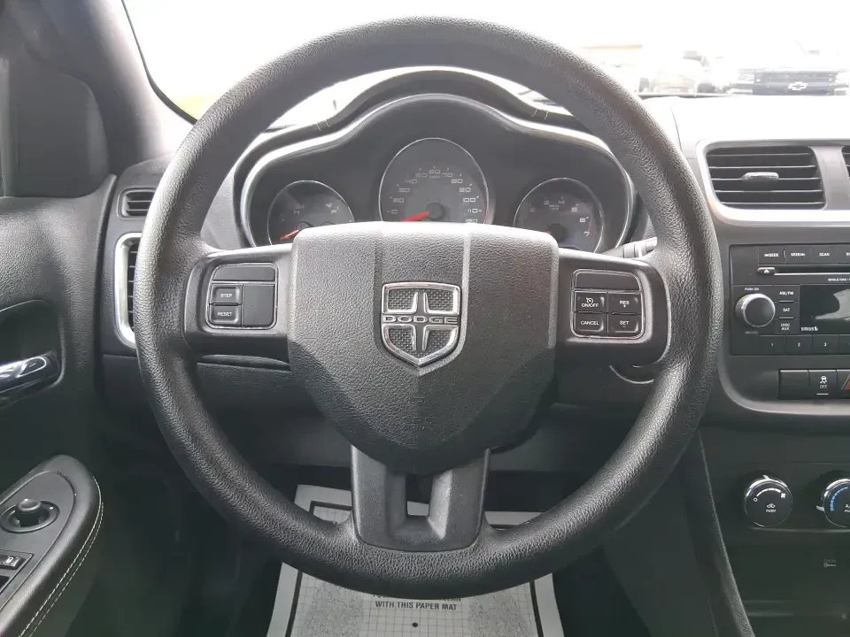 2014 Dodge Avenger SE (1C3CDZAG6EN) with an 3.6L V6 DOHC 24V FFV engine, 6-Speed Automatic transmission, located at 880 E. National Road, Vandalia, OH, 45377, (937) 908-9800, 39.891918, -84.183594 - Need a dependable commuter that still feels fun on I75, roomy enough for family errands, and confident for weekend drives to the National Museum of the U.S. Air Force? This 2014 Dodge Avenger SE in eye-catching True Blue Pearlcoat delivers the kind of real-world versatility Vandalia drivers want-com - Photo#16
