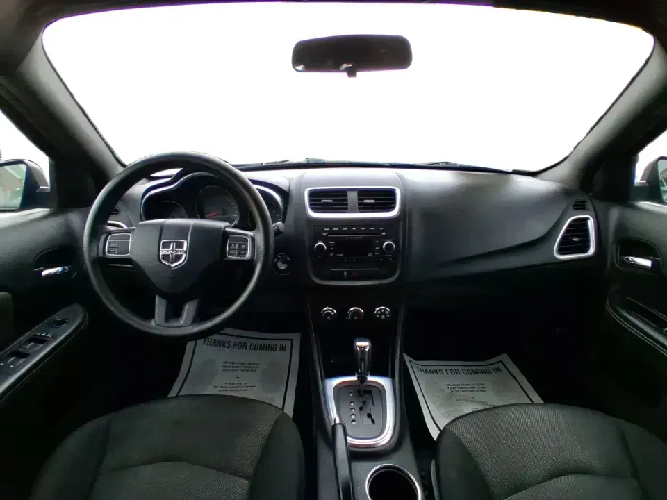 2014 Dodge Avenger SE (1C3CDZAG6EN) with an 3.6L V6 DOHC 24V FFV engine, 6-Speed Automatic transmission, located at 880 E. National Road, Vandalia, OH, 45377, (937) 908-9800, 39.891918, -84.183594 - Need a dependable commuter that still feels fun on I75, roomy enough for family errands, and confident for weekend drives to the National Museum of the U.S. Air Force? This 2014 Dodge Avenger SE in eye-catching True Blue Pearlcoat delivers the kind of real-world versatility Vandalia drivers want-com - Photo#19