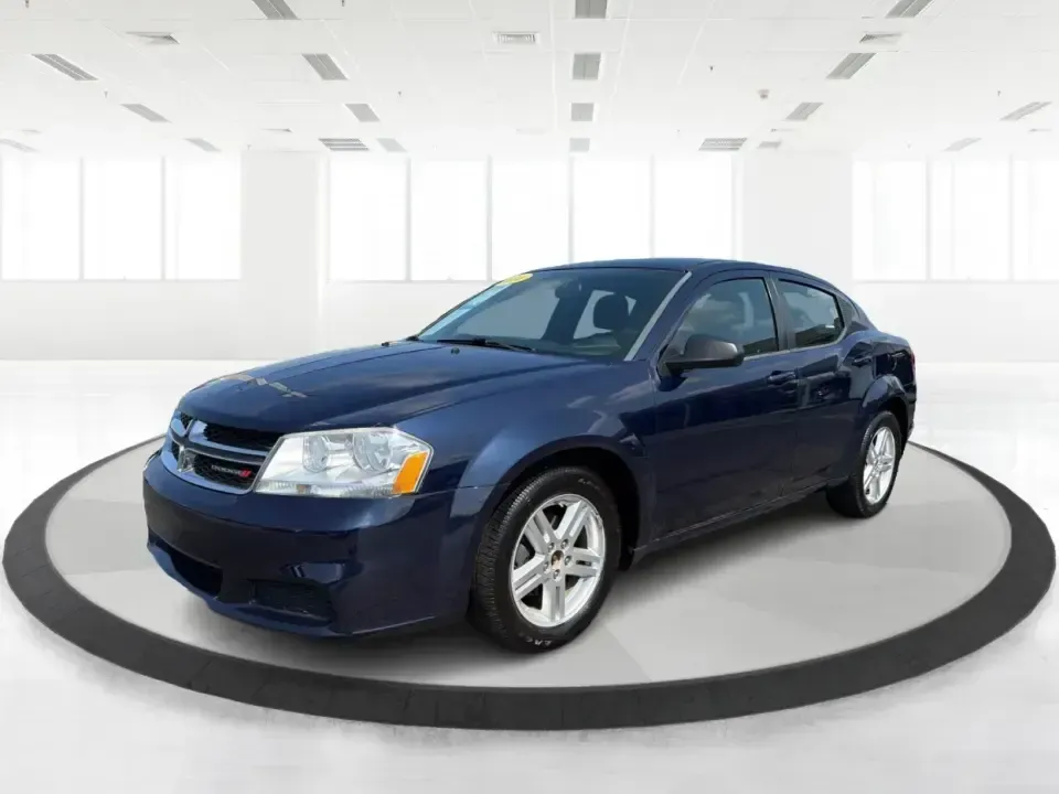 2014 Dodge Avenger SE (1C3CDZAG6EN) with an 3.6L V6 DOHC 24V FFV engine, 6-Speed Automatic transmission, located at 401 Woodman Dr, Riverside, OH, 45431, (937) 908-9800, 39.760899, -84.123421 - Need a comfortable, budget-friendly sedan that can handle the daily grind from Riverside to Downtown Dayton, quick school drop-offs, and the occasional weekend escape to Carillon Historical Park or a lap around the National Museum of the U.S. Air Force? This 2014 Dodge Avenger SE in eye-catching Tru- Photo#8
