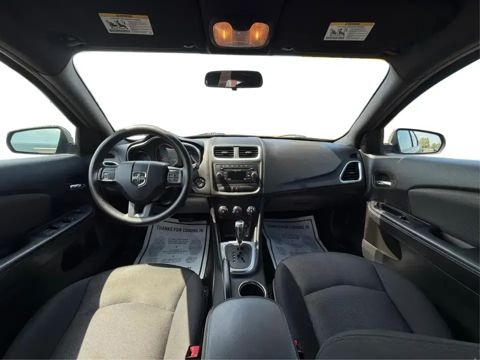 2014 Dodge Avenger SE (1C3CDZAG6EN) with an 3.6L V6 DOHC 24V FFV engine, 6-Speed Automatic transmission, located at 401 Woodman Dr, Riverside, OH, 45431, (937) 908-9800, 39.760899, -84.123421 - Need a comfortable, budget-friendly sedan that can handle the daily grind from Riverside to Downtown Dayton, quick school drop-offs, and the occasional weekend escape to Carillon Historical Park or a lap around the National Museum of the U.S. Air Force? This 2014 Dodge Avenger SE in eye-catching Tru- Photo#20